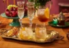 Tonic gin garnished with dried orange and blonde accents