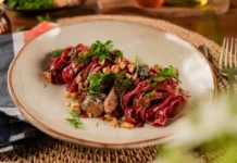 Noodles made from beets served with sardines