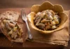 Sardine crostini topped with caramelized onions and Sicilian lemon.